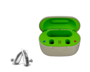 Open green hearing aid charging case with left and right slots and devices beside it