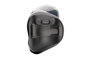 Close-up of custom in-ear hearing aid shell with battery compartment detail