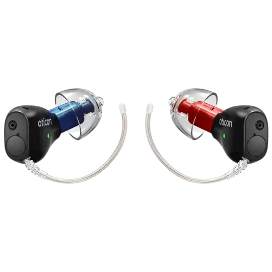 Oticon Zeal hearing aids in matte black with blue and red receivers.